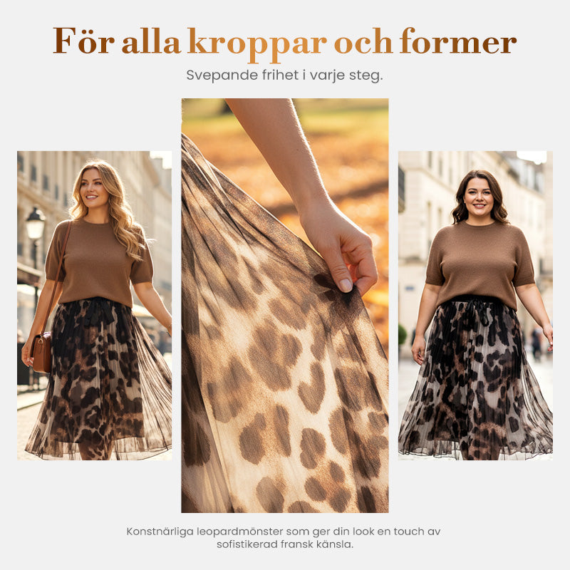 Tvådelat set för kvinnor med tröja och fladdrande leopardmönstrad kjol