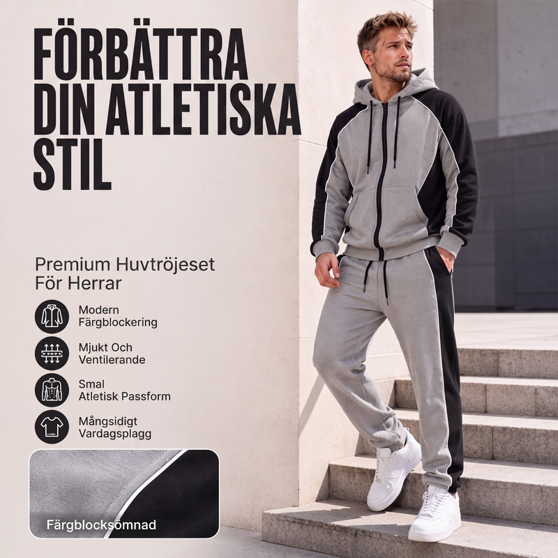 Herrset med huvtröja med dragkedja och färgblock samt träningsbyxor