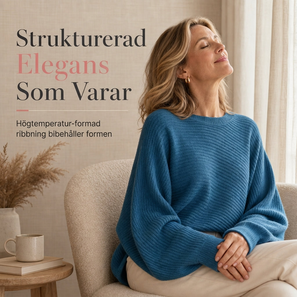 Ledigt stickad tröja med rundhals, lös passform, fladdermuslångärmar och enfärgad design
