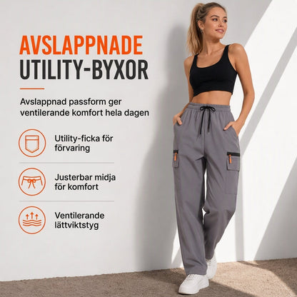 Damets lediga cargo-sweatbyxor, lös passform, snabbtorkande och andningsbara långbyxor med fickor