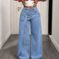 Damhoodiga trendsatta jeans med asymmetrisk överlappning och vid ben